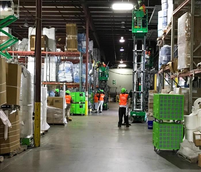 SERVPRO team working to restore a Murfreesboro warehouse after a water damage event