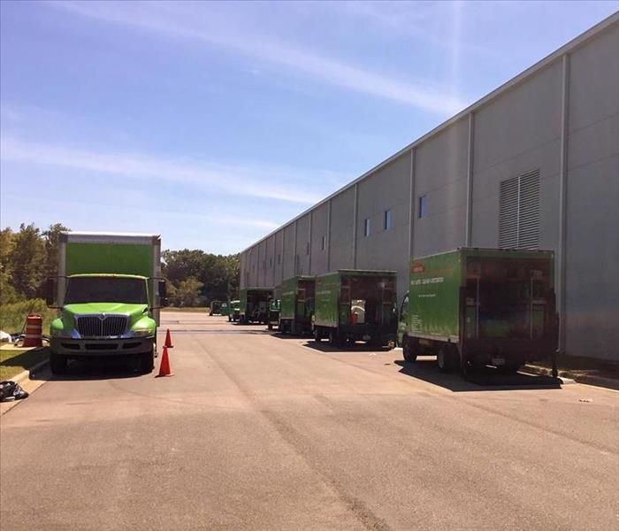 SERVPRO trucks parked behind a Rutherford County business
