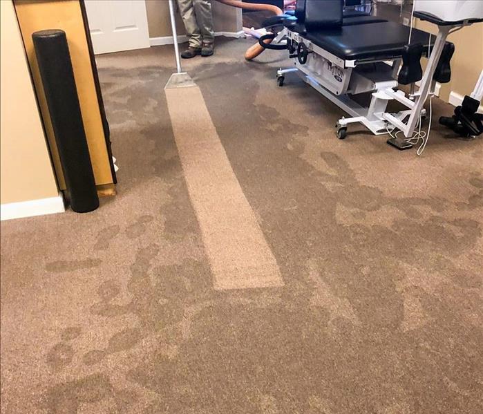 Carpet water extraction in action.
