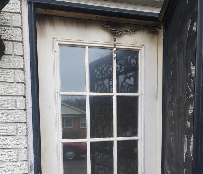 Door to an apartment that has experienced fire damage